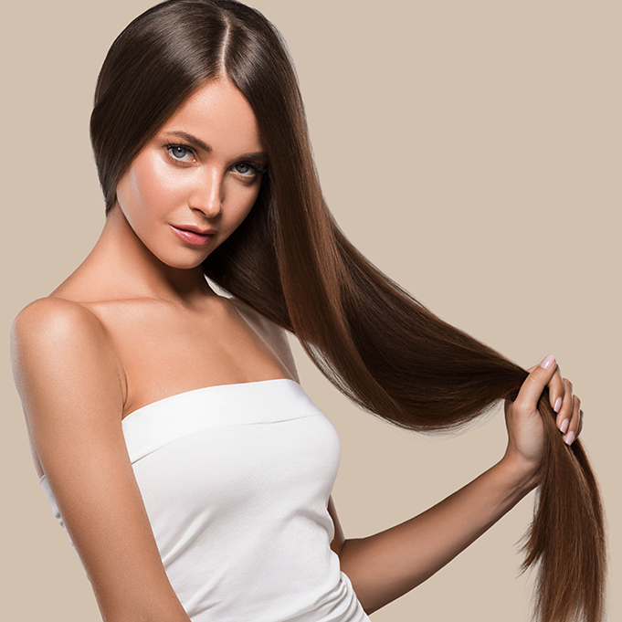 Beautiful smooth hair long brunette hairstyle woman healthy skin