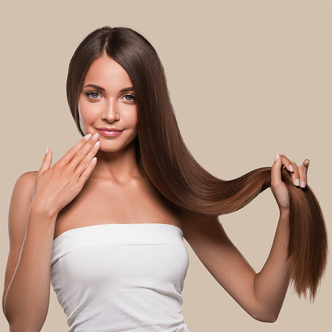 Beautiful smooth hair long brunette hairstyle woman healthy skin